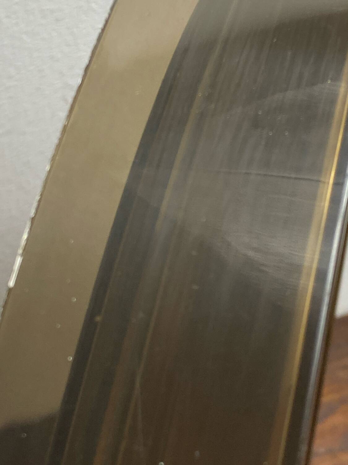 Circular mirror, smoked plastic, 1960s/70s.