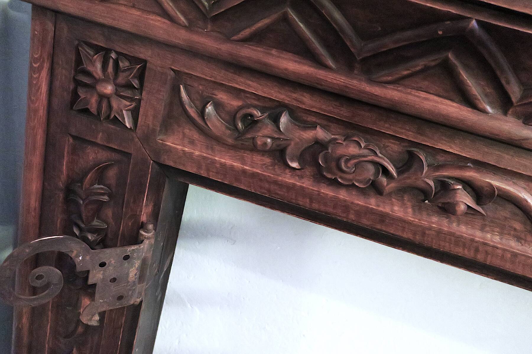 Art deco fireplace in carved solid teak and wrought iron, 1920