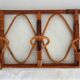 Vintage wall coat rack in bamboo and rattan.