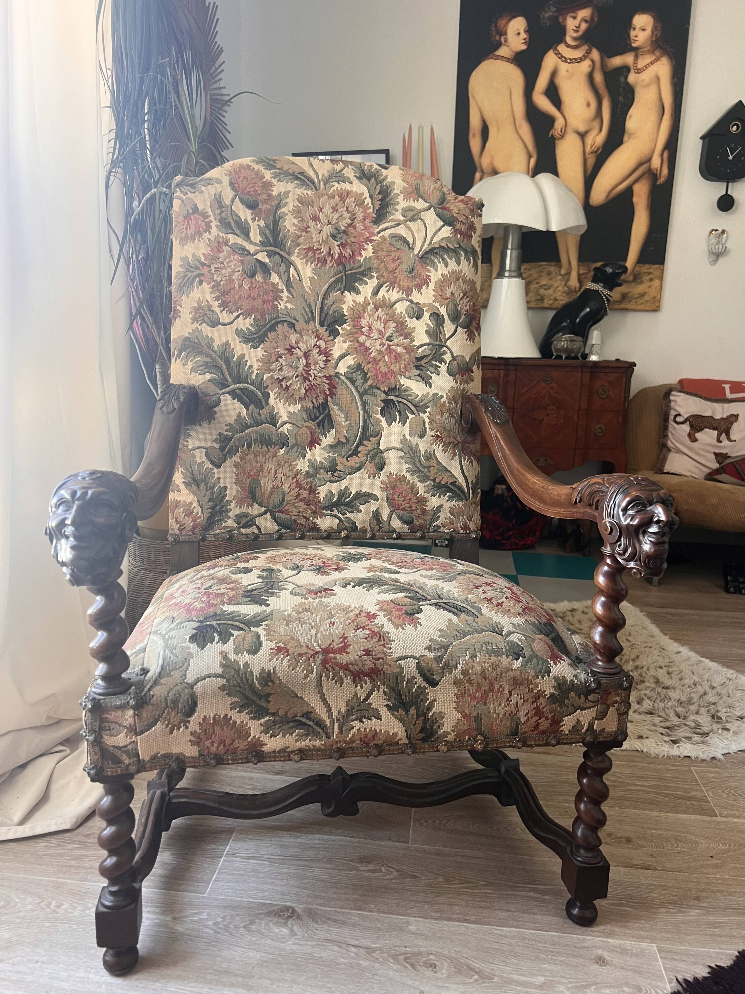 Antique armchair in Henri II style with masks
