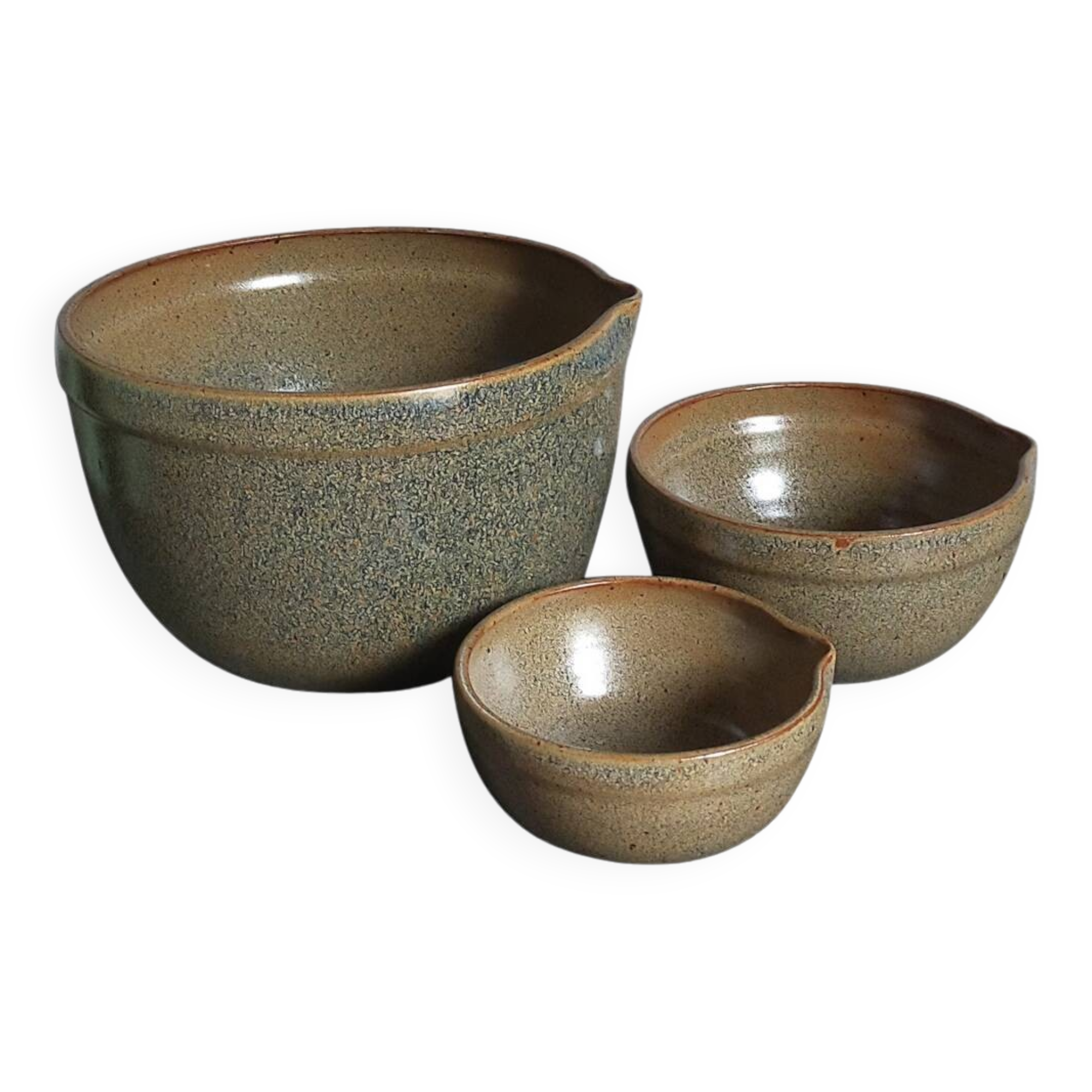 Three nesting pottery salad bowls in glazed stoneware