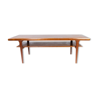 Coffee table with shelf in teak of danish design from the 1960s.