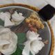 Frame dried flowers and synthetic flowers of oval shape Bombé