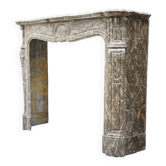 Louis XV style fireplace in Stinkal marble around 1880.