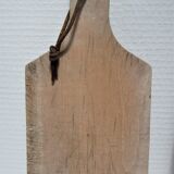three vintage patinated solid wood cutting boards
