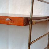 String shelf by Nisse Strinning with three mahogany shelves. Gungrey metal sides.