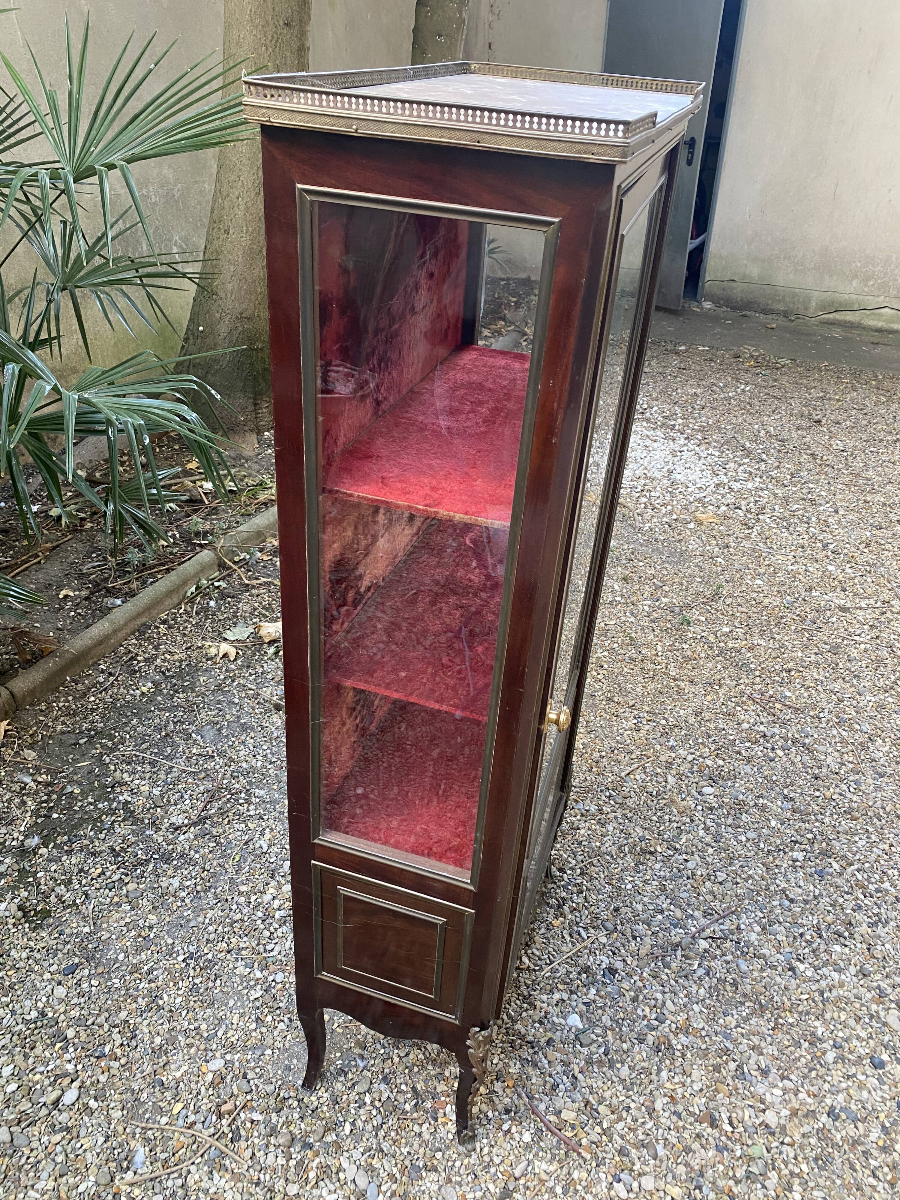19th/20th century mahogany display cabinet, marble top and glass sides.
