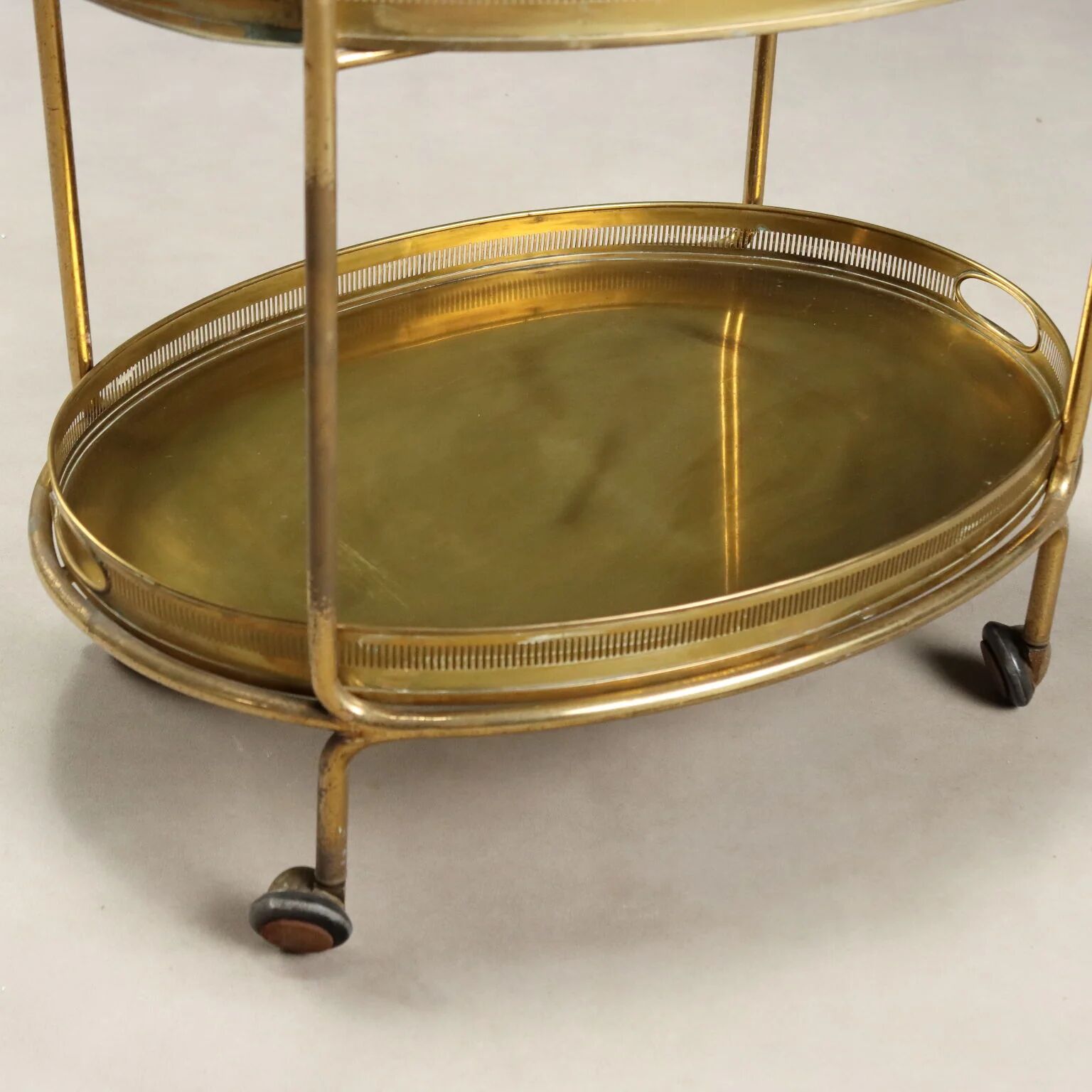 Vintage double-tier brass serving trolley, 1950s design.