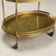 Vintage double-tier brass serving trolley, 1950s design.
