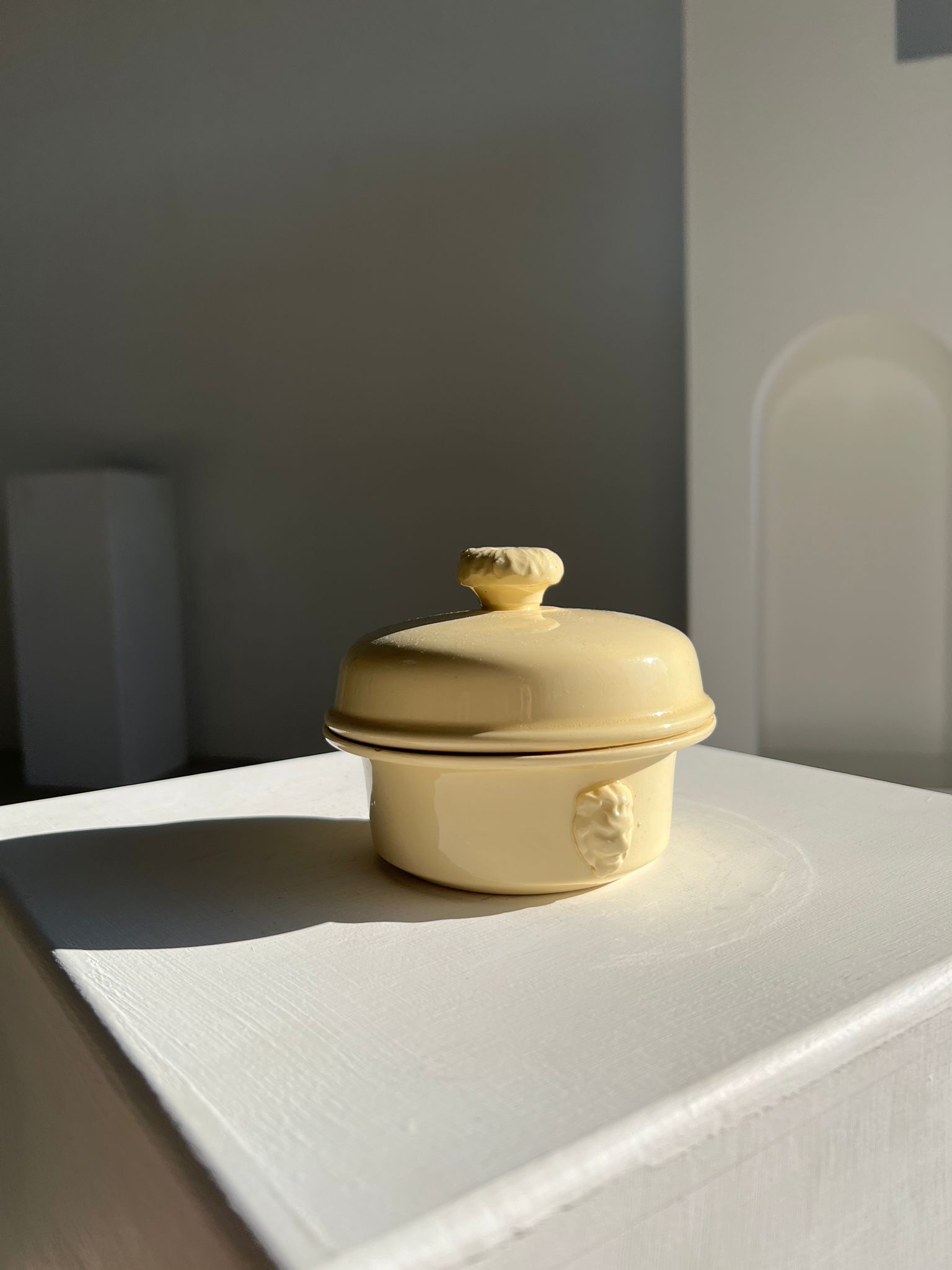 Glazed light yellow ceramic terrine