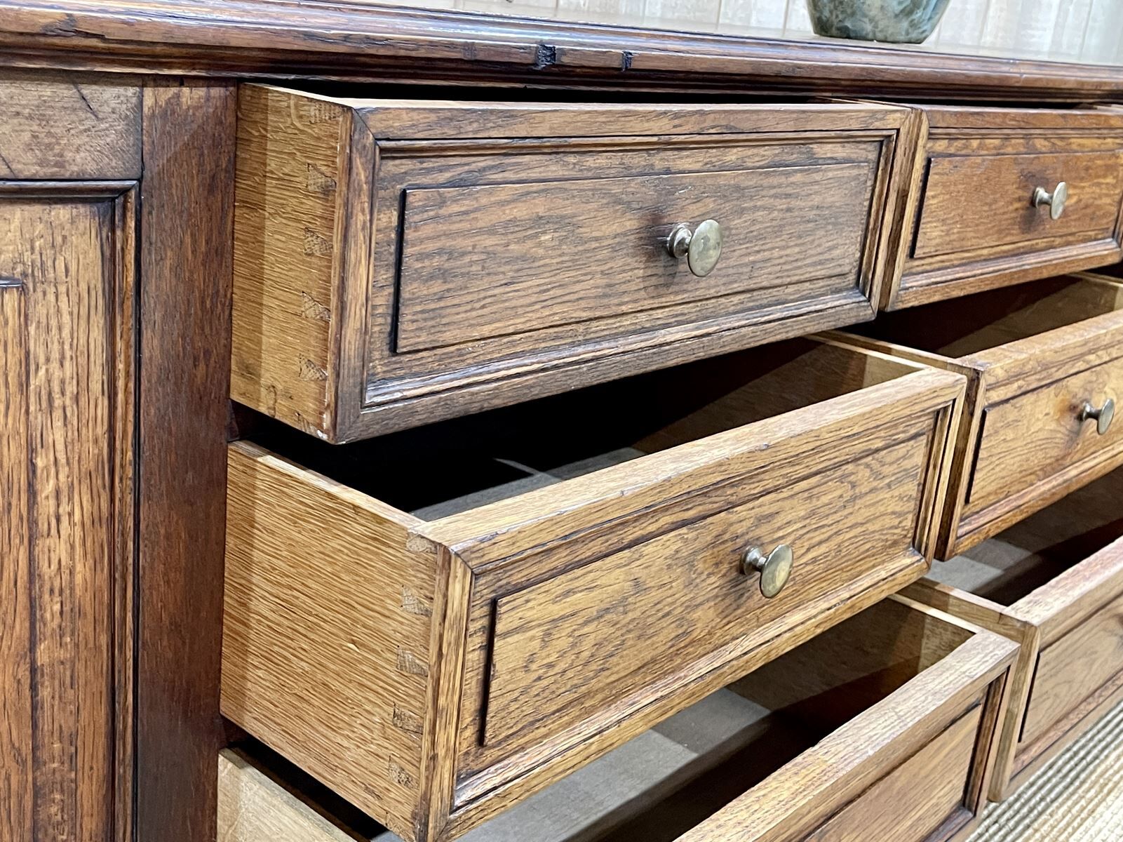 Long low oak countertop with 12 drawers - early XXth