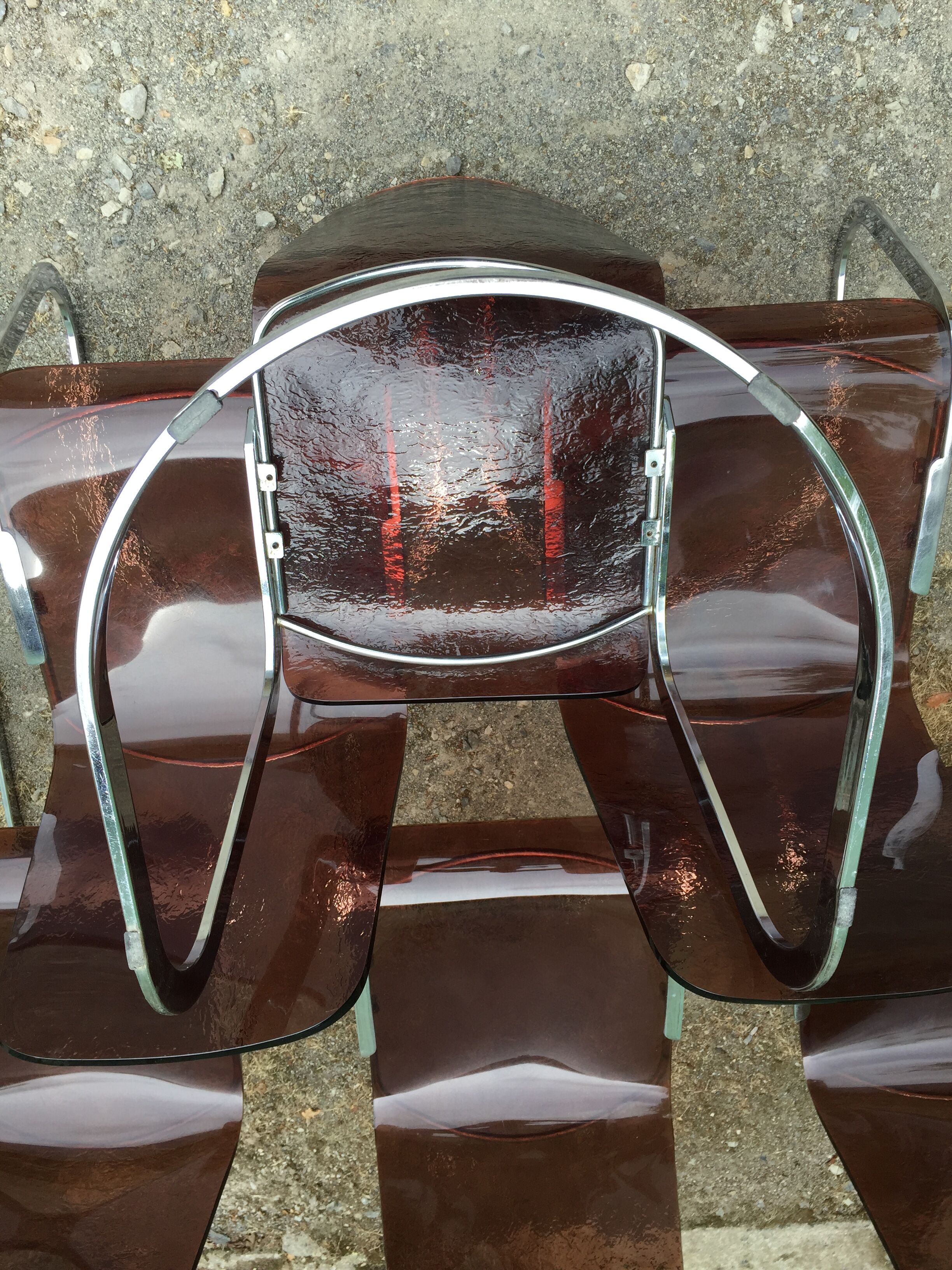 Chairs in plexiglas with chrome metal base