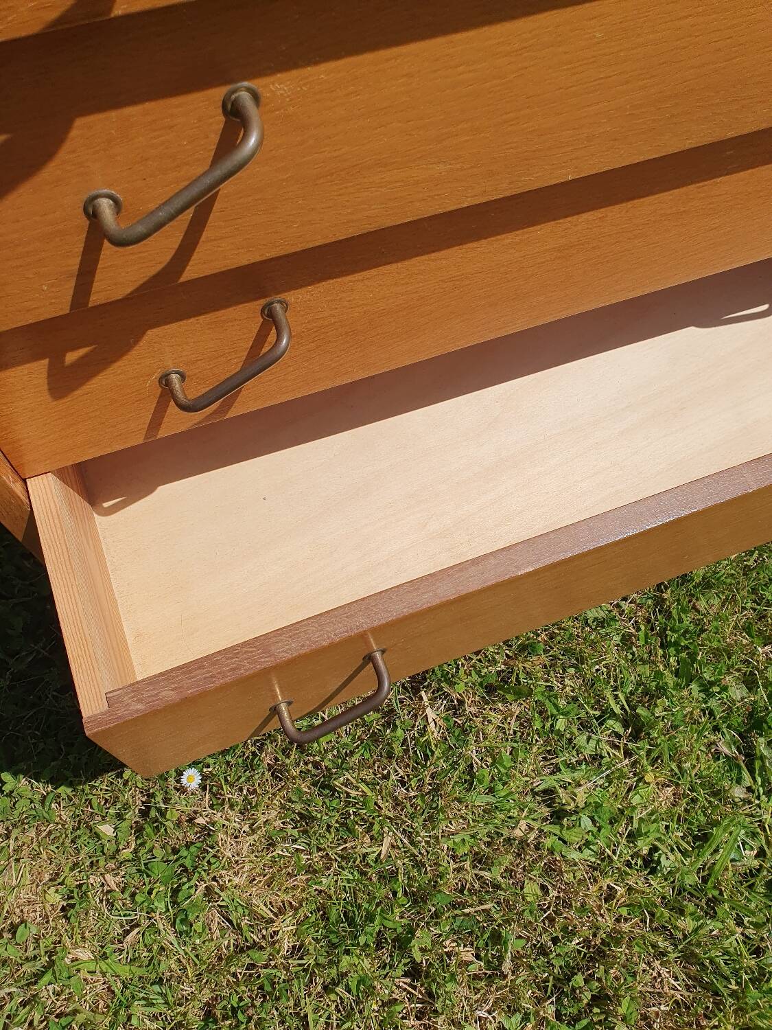 Compass feet chest of drawers