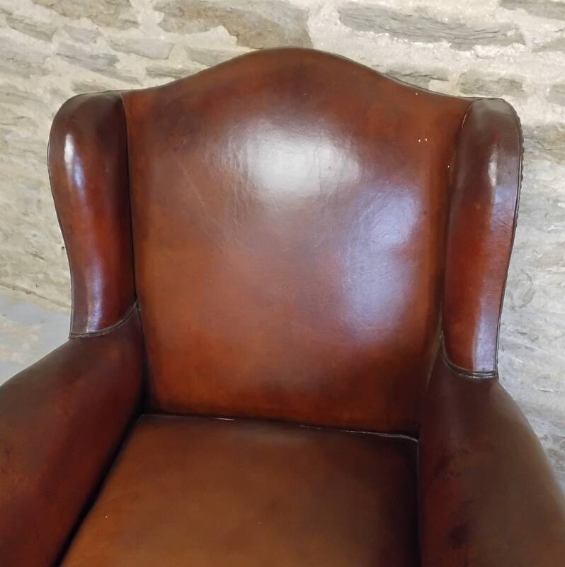 Fauteuil club ancien à oreilles