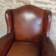 Fauteuil club ancien à oreilles
