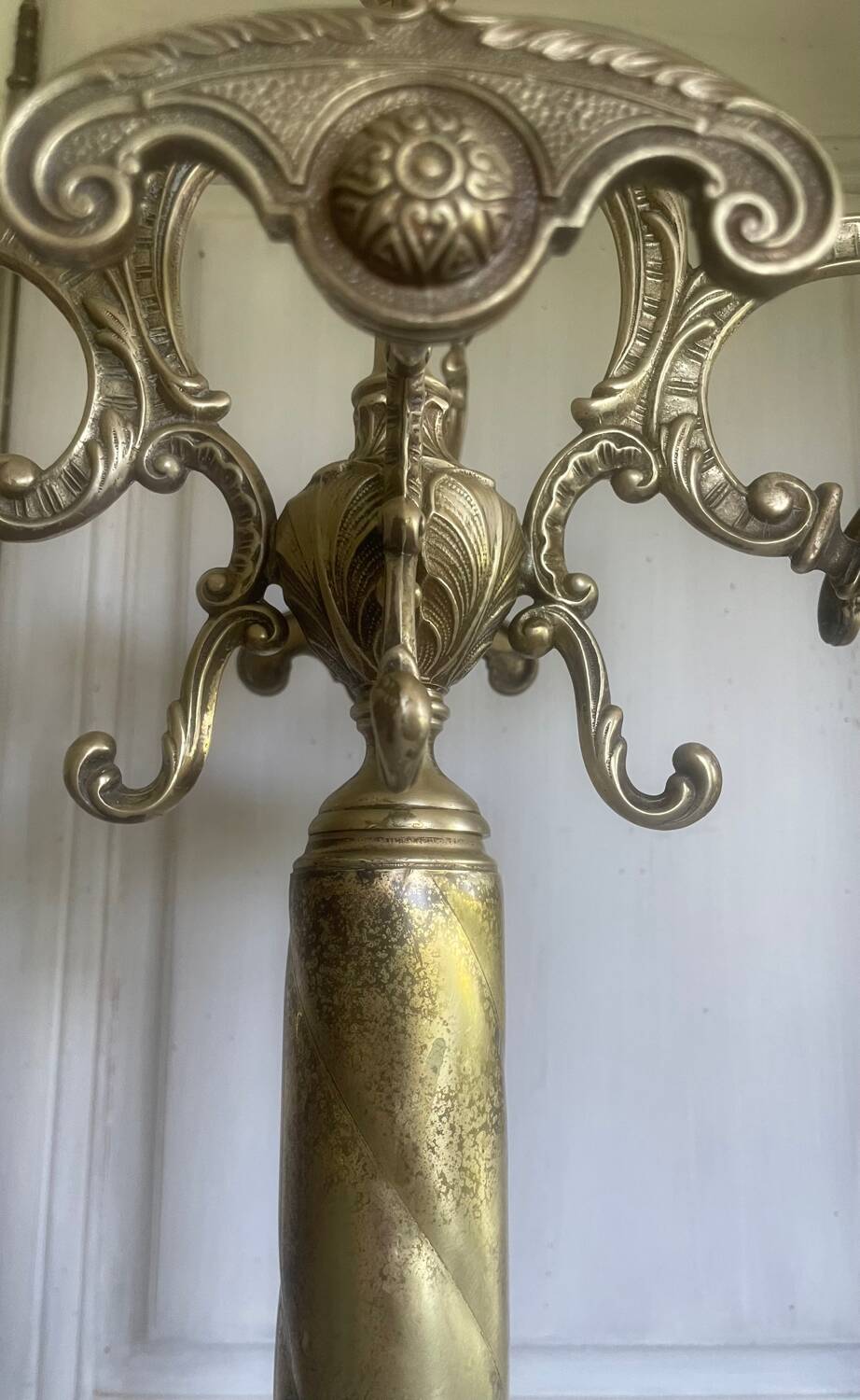 Freestanding brass coat rack