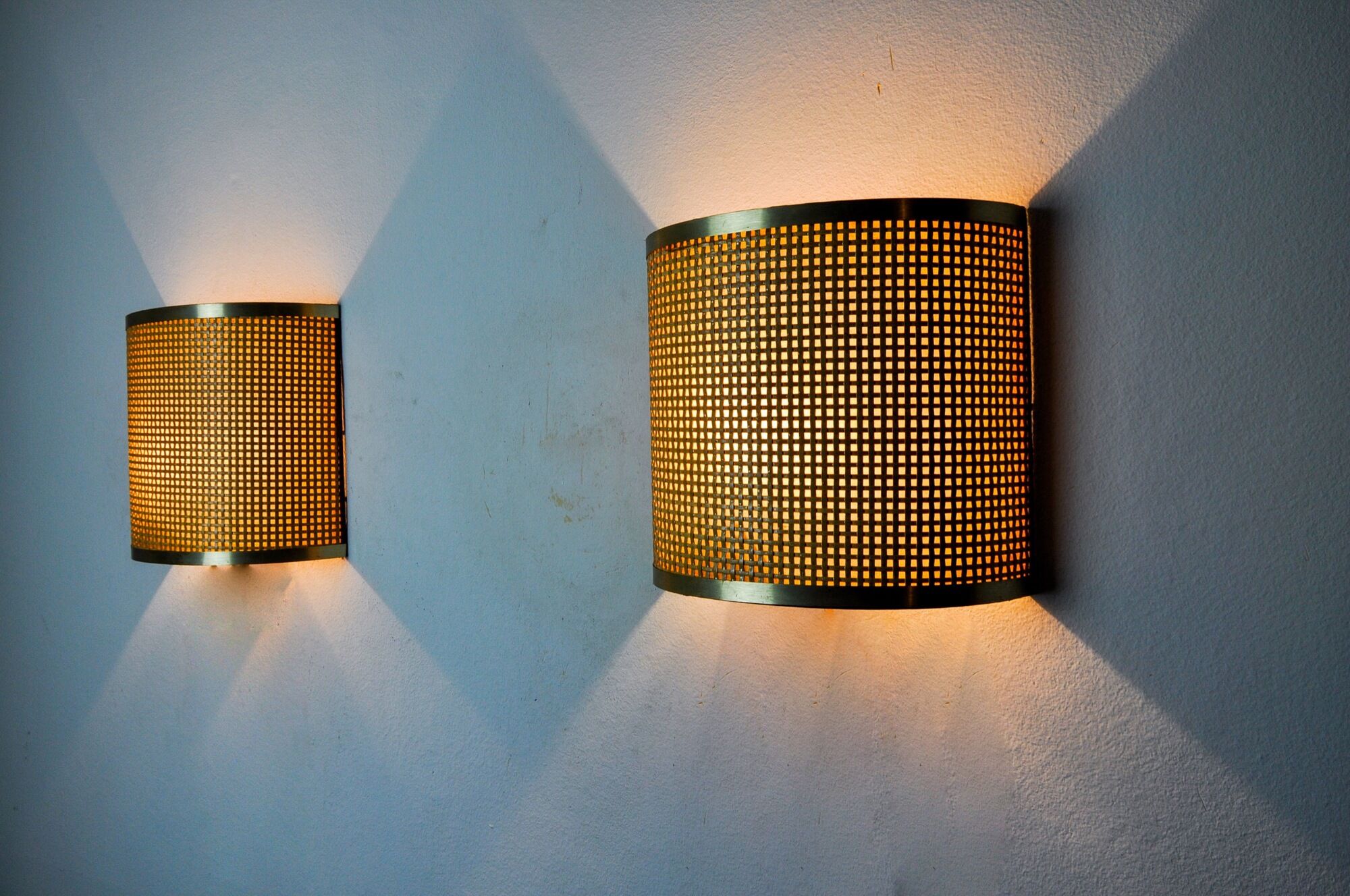 Pair of rattan and brass appliques, Italy, 1960