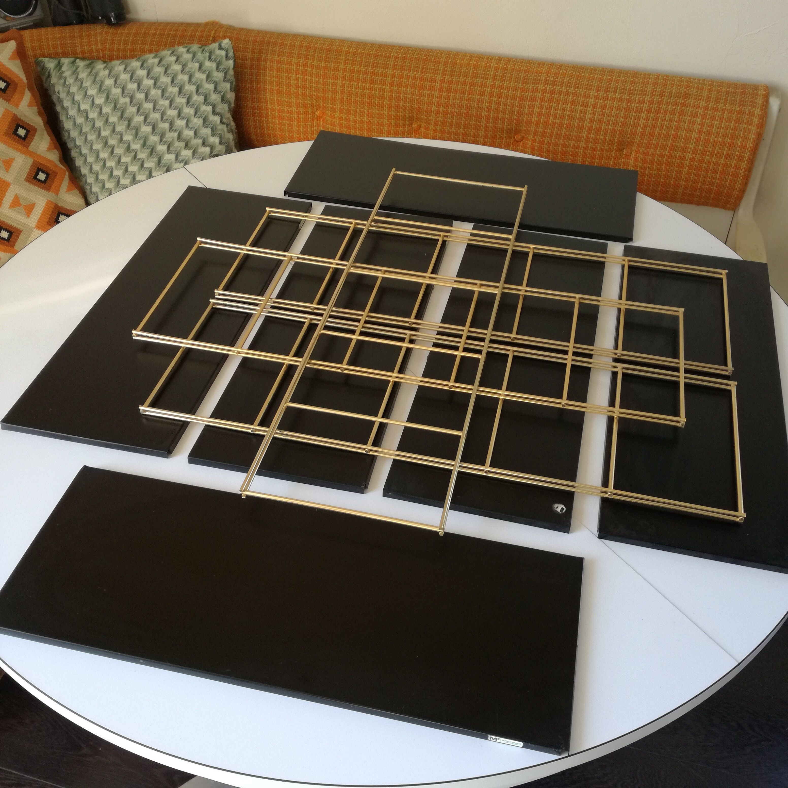 Gold and black thong shelf