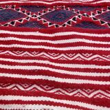 Handmade multi-coloured red carpet