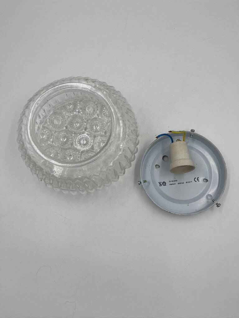 Molded glass ceiling light with relief