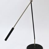 Articulated floor lamp with counterweight mid-century by Rupert Nikoll, nickel, brass.