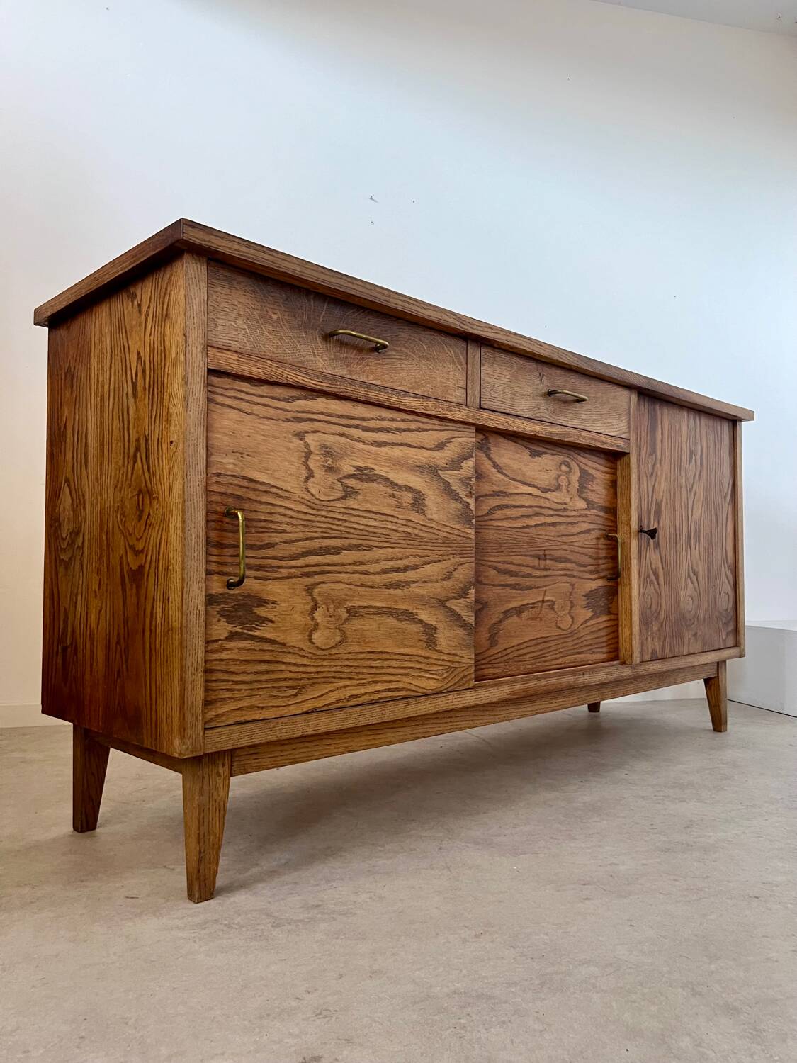 Old oak sideboard from the 1950s, vintage reconstruction period
