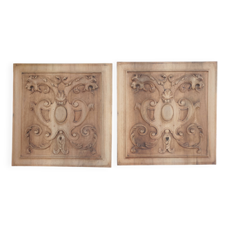 Pair of antique carved walnut panels