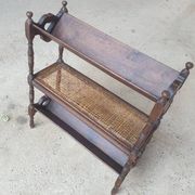 Magazine/book rack in oak with a caned top - early 20th century