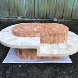 Vintage asymmetrical design coffee table in Mactan travertine stones by Magnussen ponte.