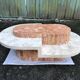 Vintage asymmetrical design coffee table made of Mactan travertine stones by Magnussen.