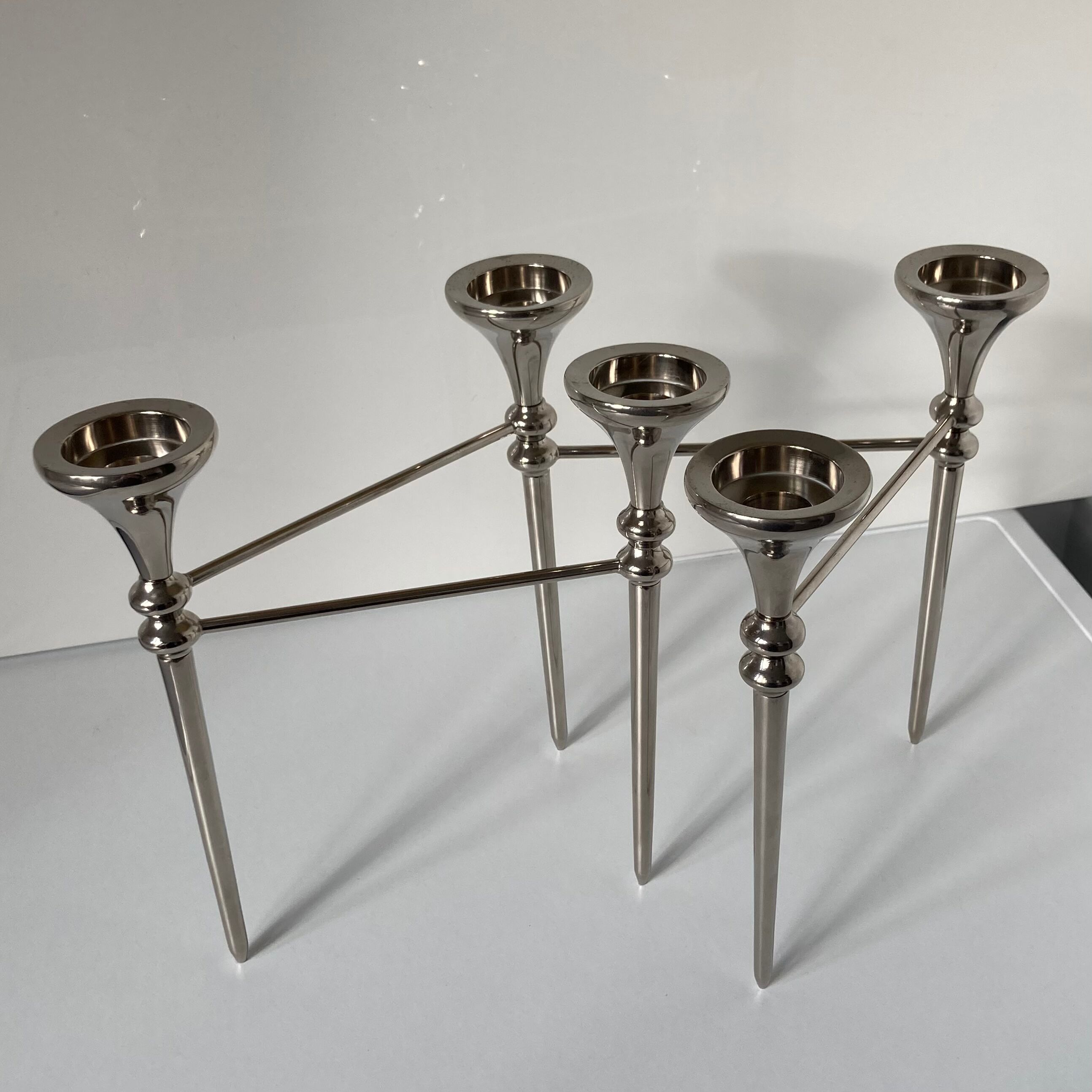 Articulated candlestick for 5 candles in chromed steel from the 1970s