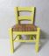 small yellow wooden children's chair