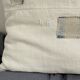 Coussin carré en toile ancienne style kilim tissé, patché, monogramme AB