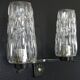 Pair of wall lights from the 1950s-1960s with a push button switch.