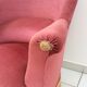 Toad in powder pink velvet armchair