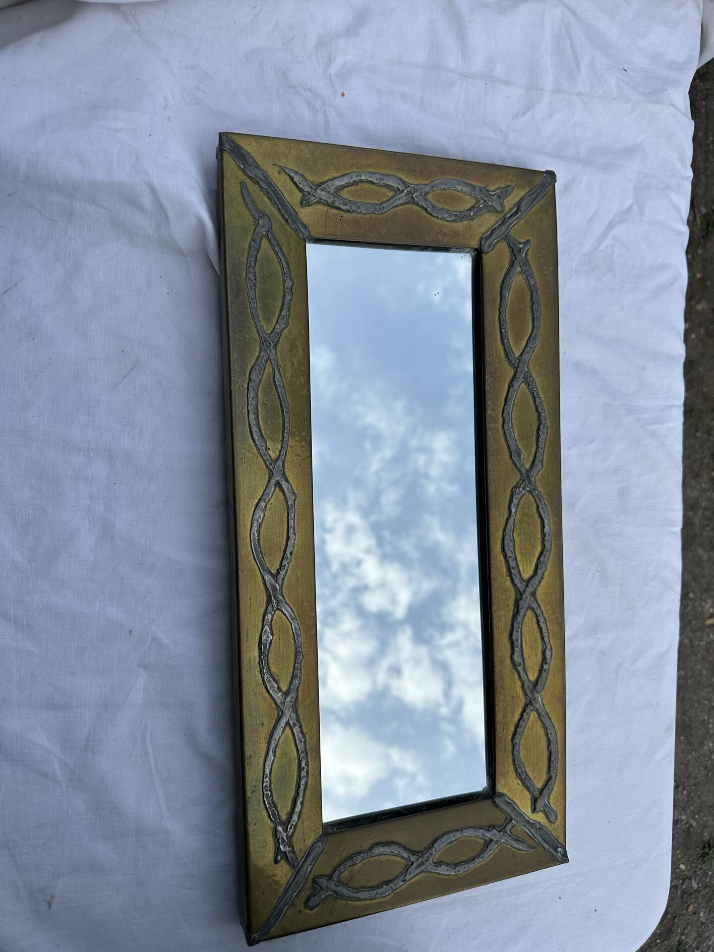 Brutalist mirror by Jean Goardere