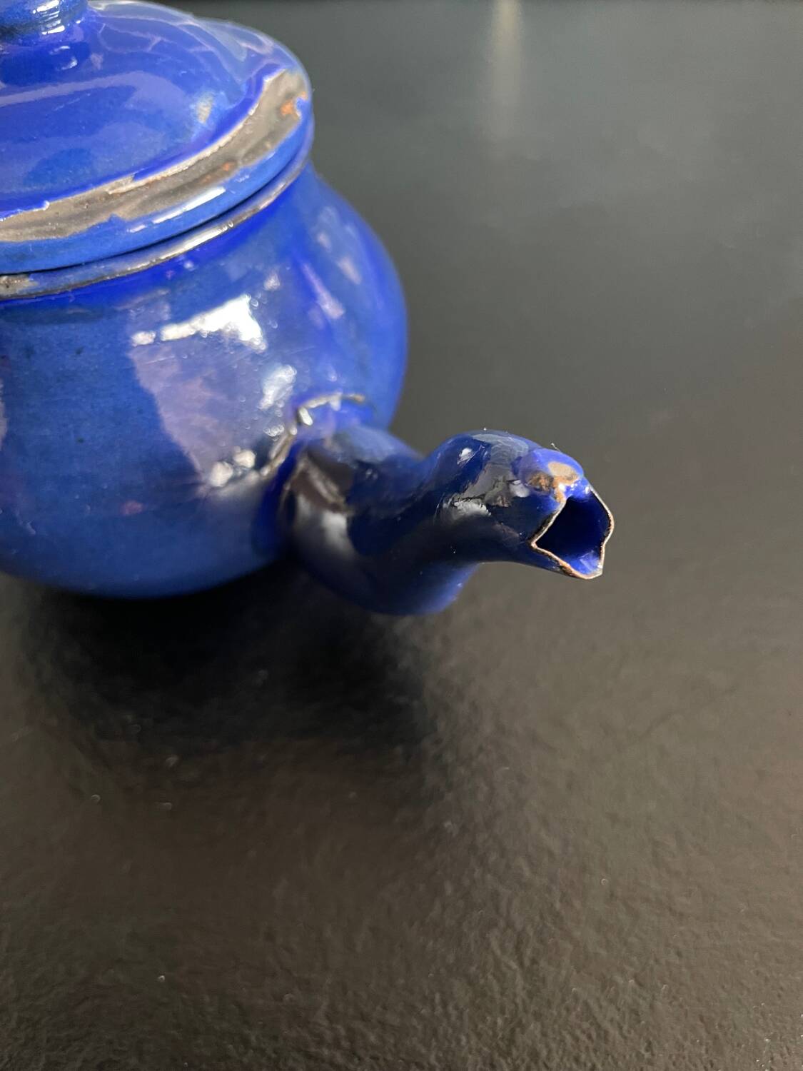 Mini blue enamelled sheet metal teapot