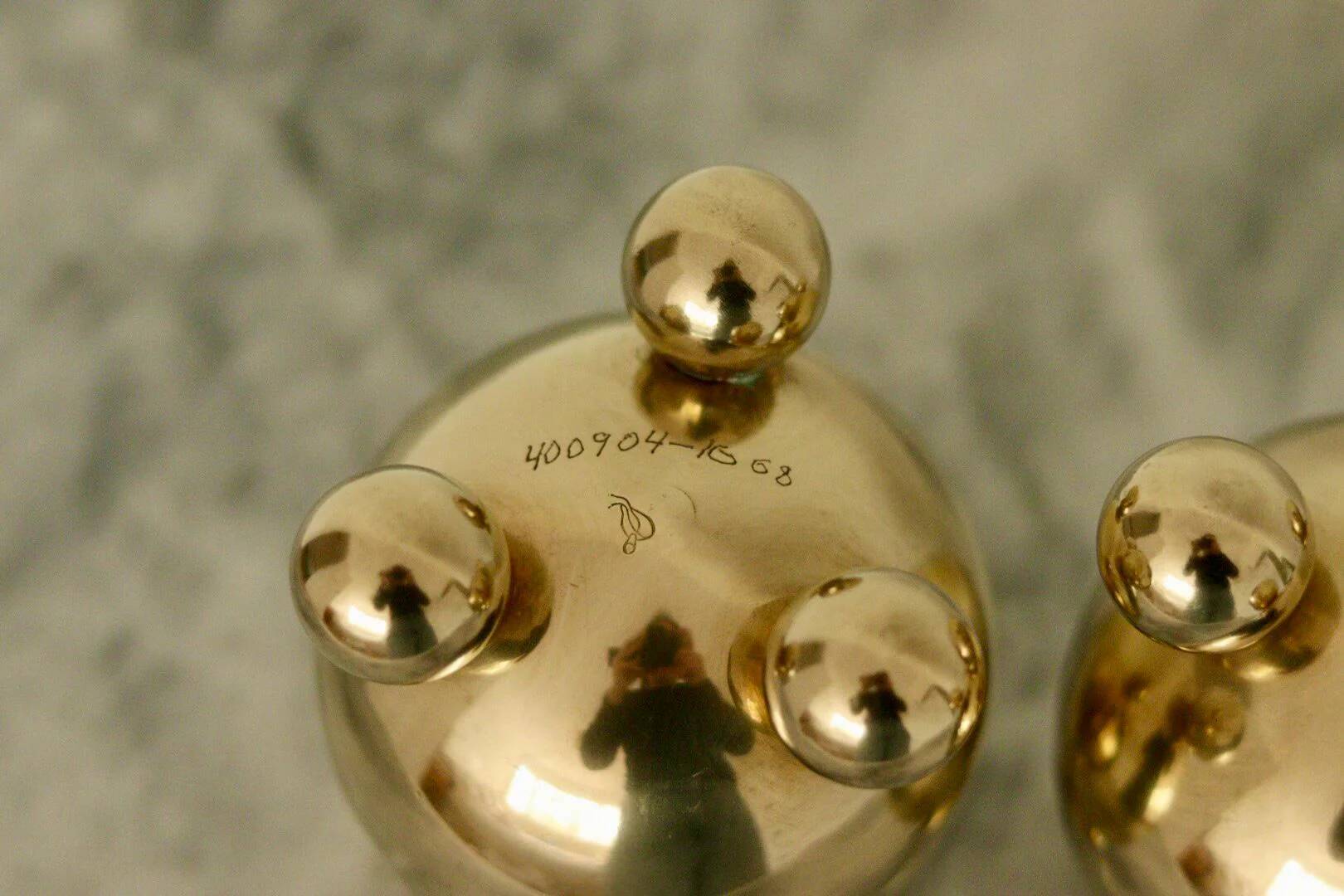 Pair of mid-century Swedish heavy brass candle holders