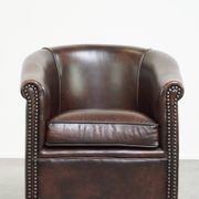 luxury dark leather club chair with English-style ball feet