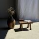 Small stool, rectangular curved accent stool in solid teak.