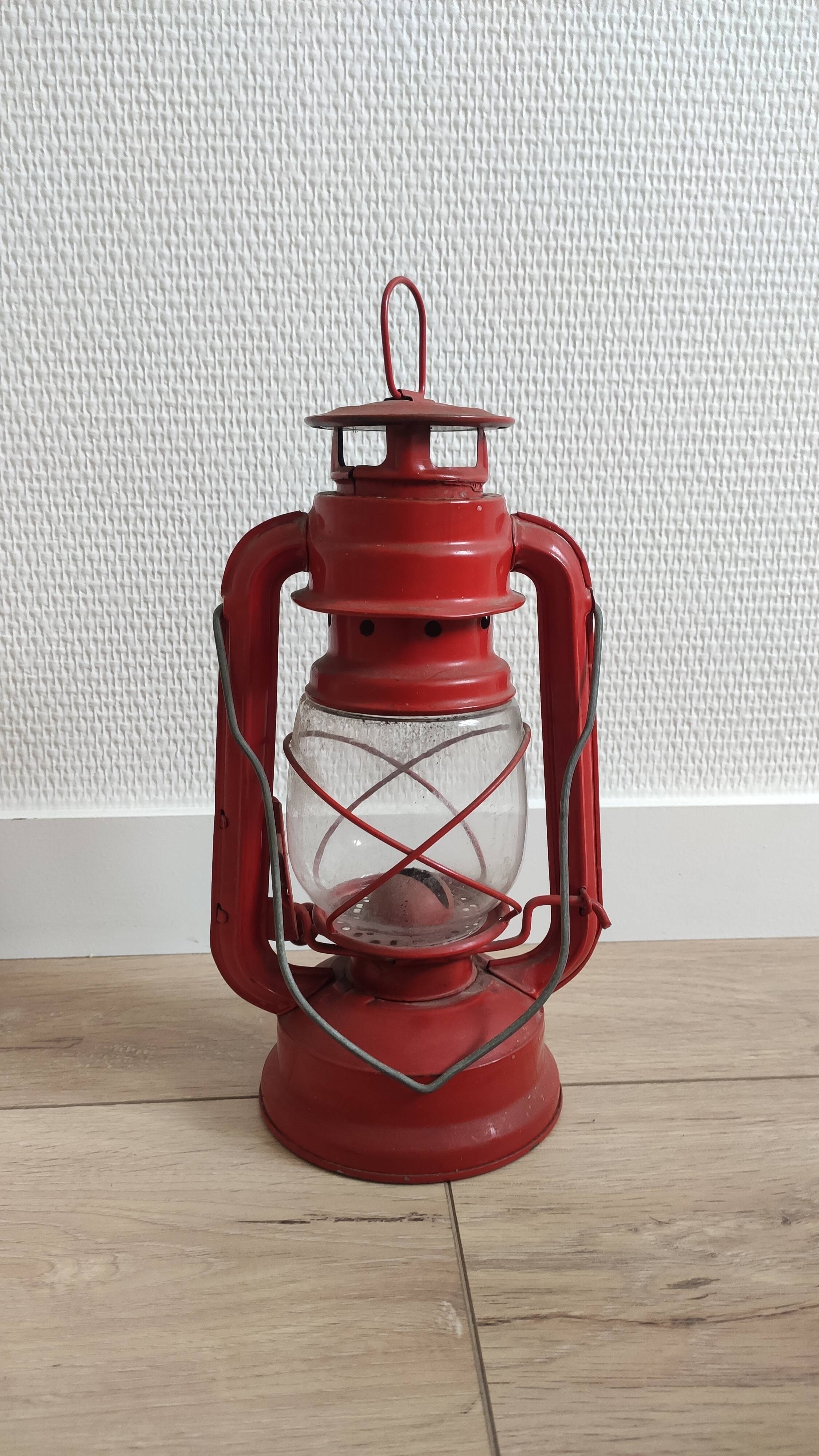 Vintage red retro patinated kerosene lamp
