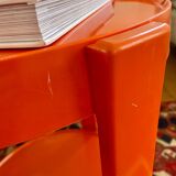 Round orange plastic side table 1970