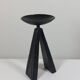 Vintage candle holder made of hand-forged metal, in a brutalist style.
