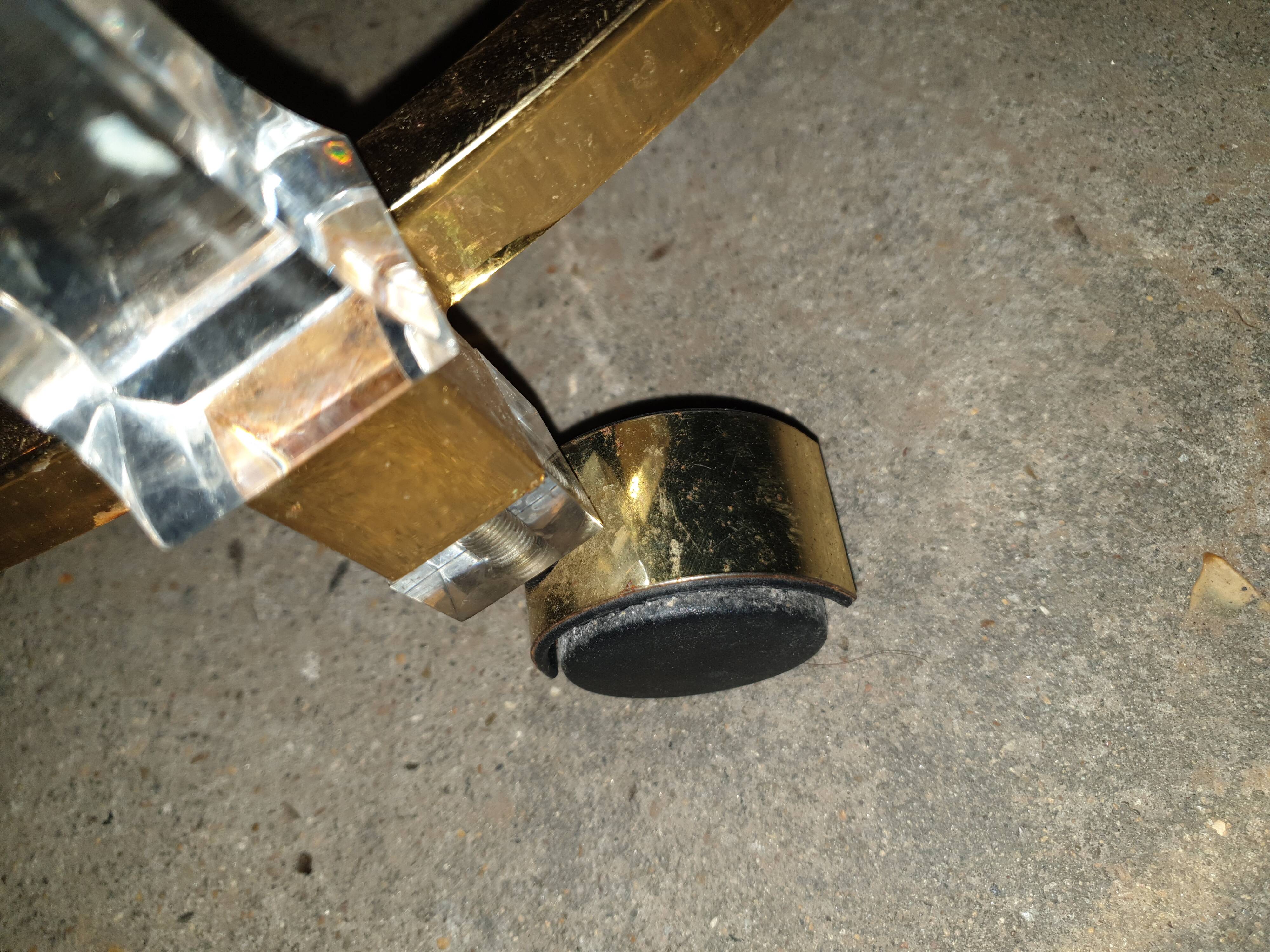 Round table in glass and brass and acrylic columns, 1980