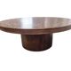 Vintage round wooden coffee table with a copper top.