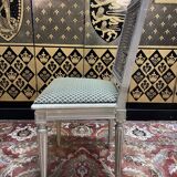 Set of 4 Louis XVI style caned chairs Jean Mocque
