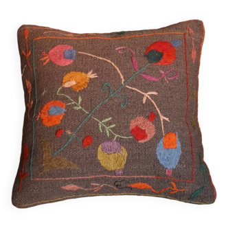 Colorful wool suzani cushion with bohemian embroidery