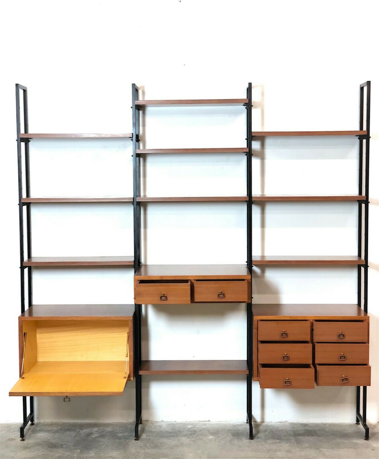 Modular storage unit and teak bookcase. Italy, 60s