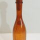 Amber bottle in bubbled blown glass, signed Biot – France, vintage 1970s