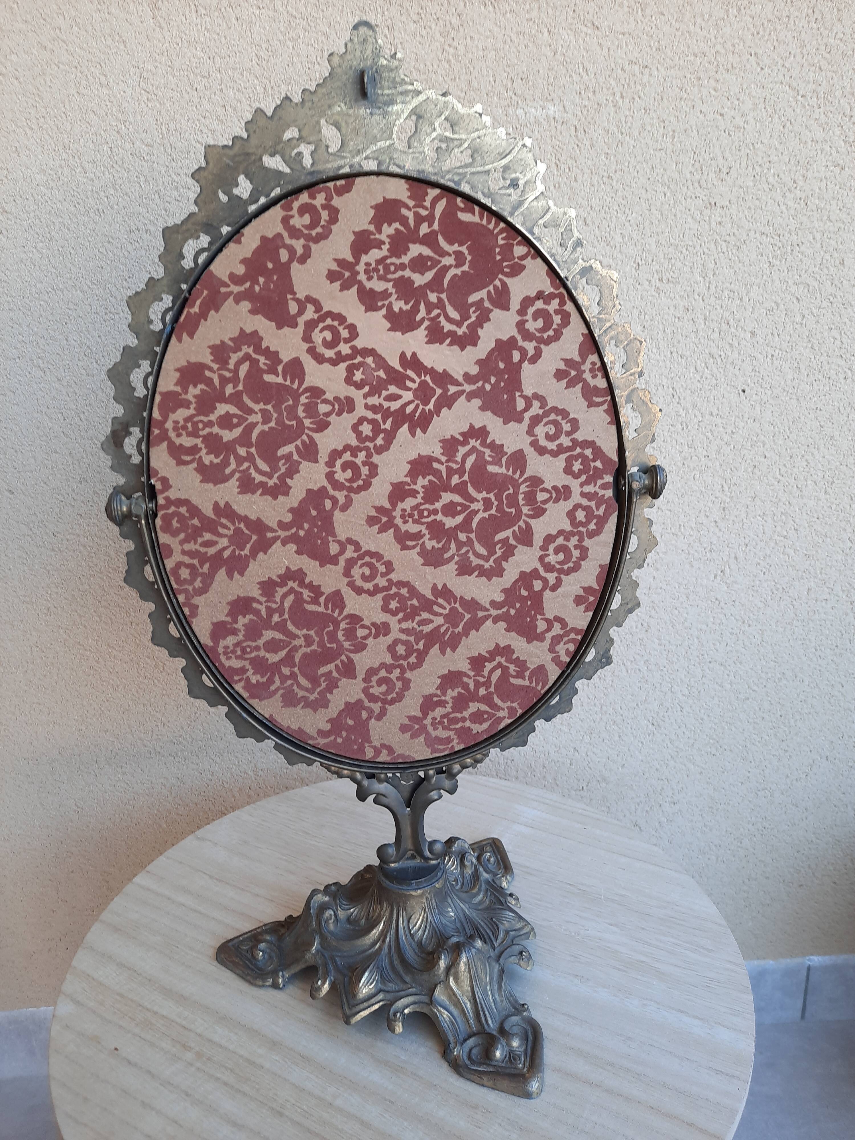 Mirror on foot, swivel, brass, mid-late nineteenth, rock style.